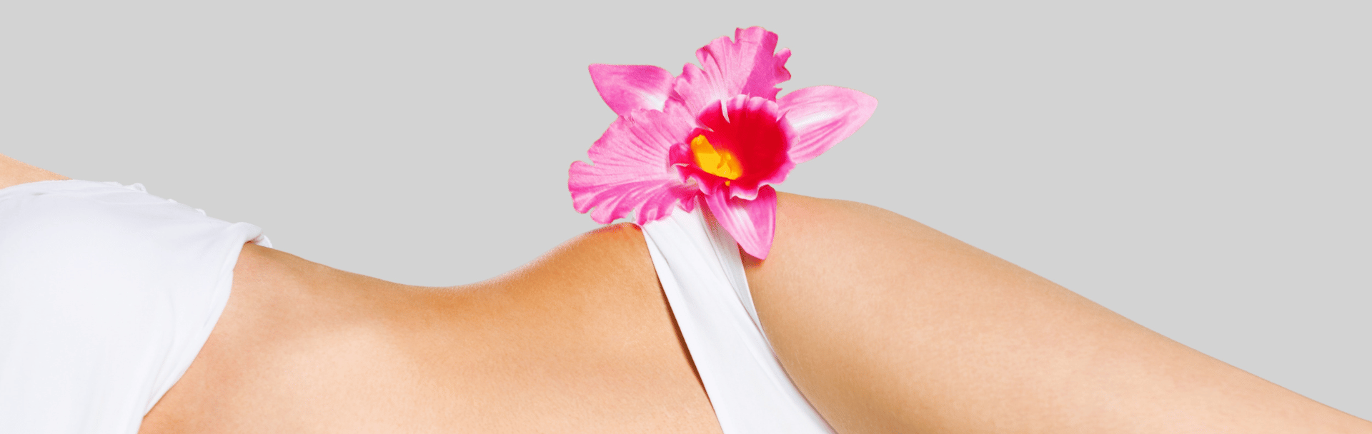 Female side profile with pink flower