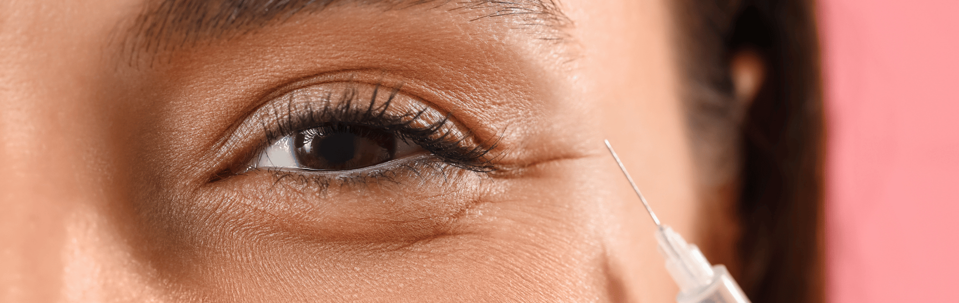 close up female receiving eye rejuvenation treatment