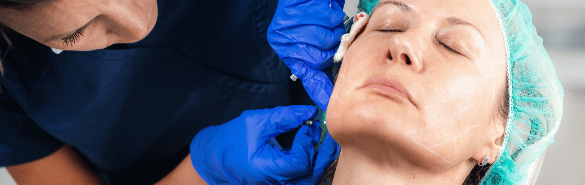 Female patient receiving thread treatment
